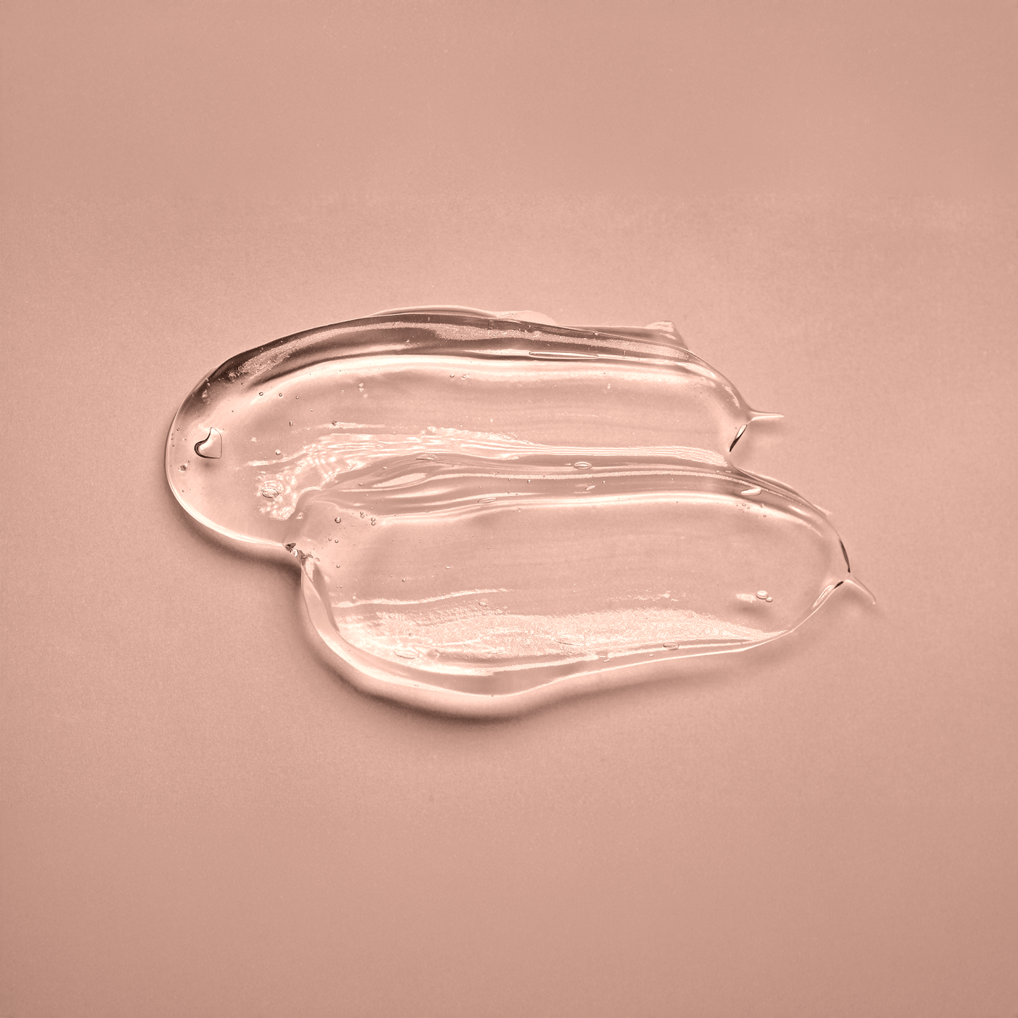 Texture close‑up: snail mucin essence droplet